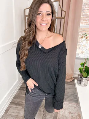 Exposed Edge Long Sleeve Top in Black